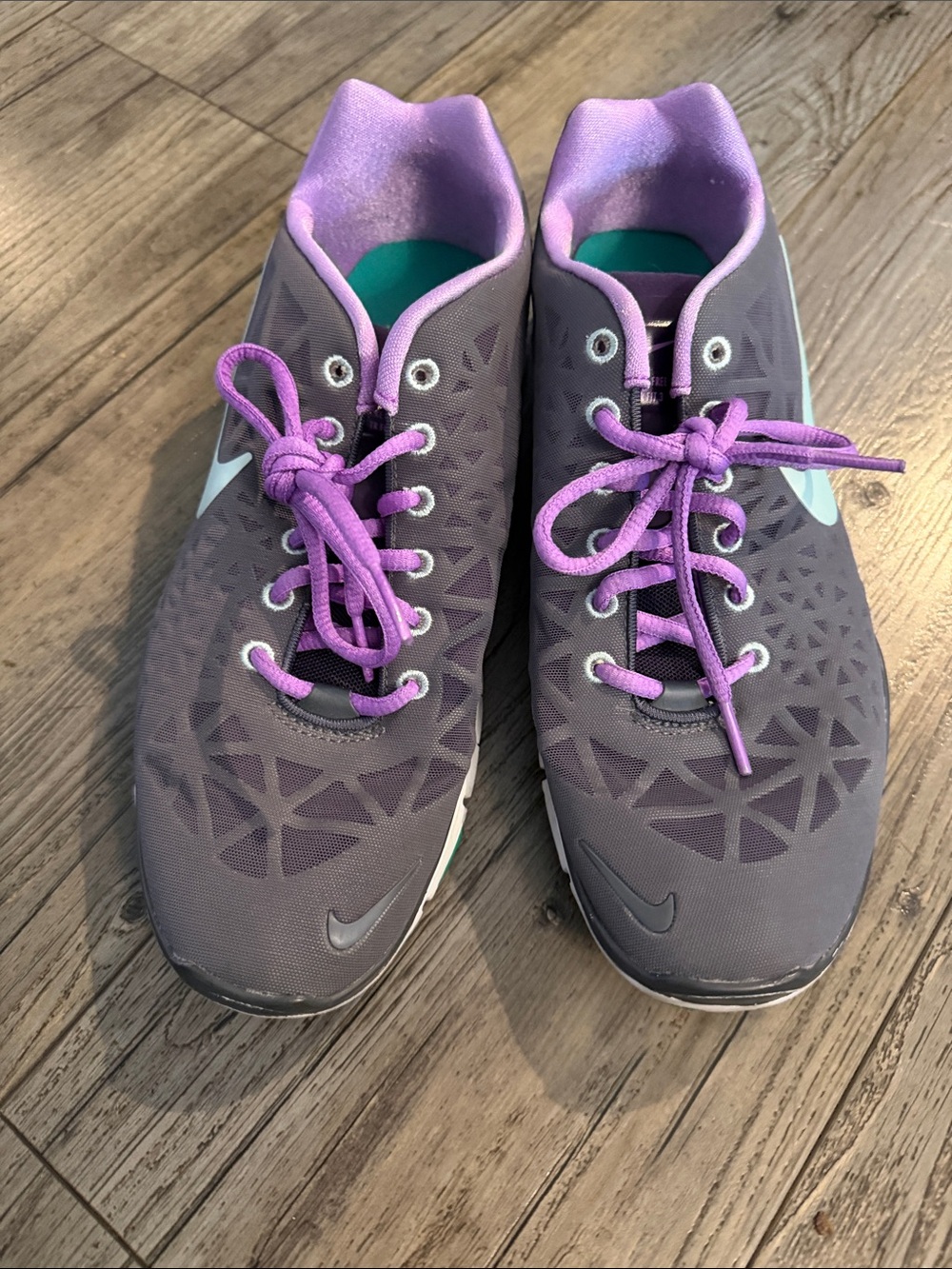 Nike Women's Purple Athletic Sneakers with Lavender Laces and Teal Insole